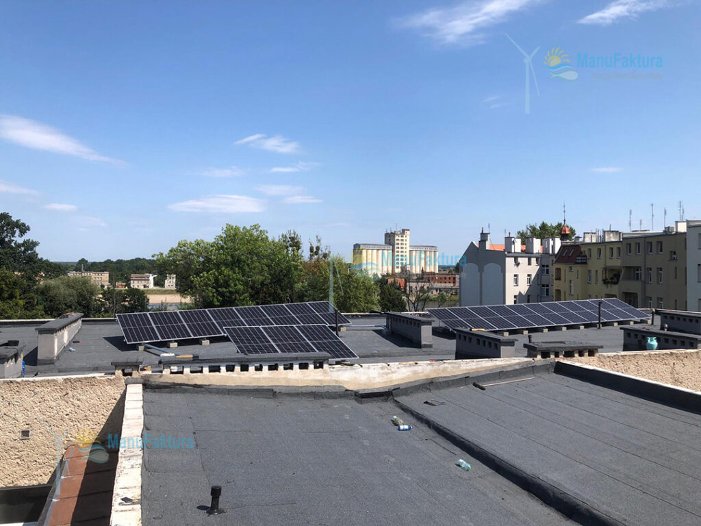 Fotowoltaika Brzeg woj. Opolskie - instalacja paneli słonecznych na dachu płaskim budynek wielorodzinny